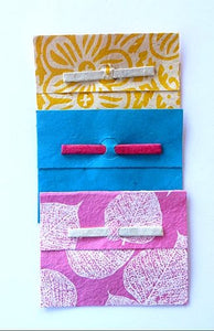 Gift envelope with paper enclosures
