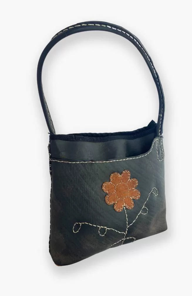 Cross pocket recycled tire bucket bag