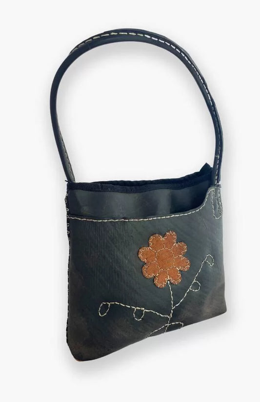 Cross pocket recycled tire bucket bag