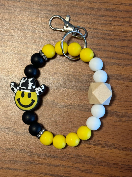 Yellow smiley Face wristlet
