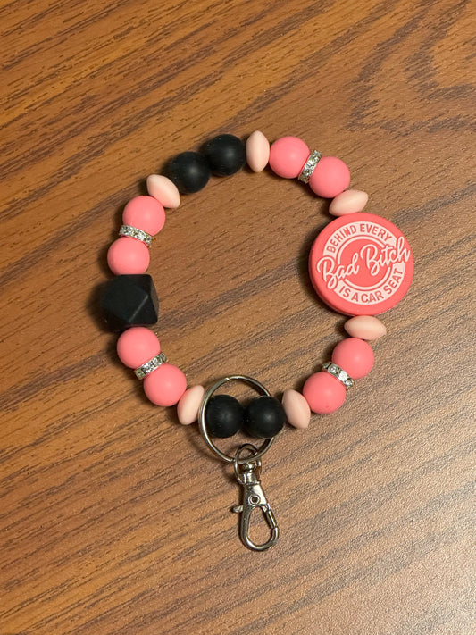 Behind every bad bitch is a car seat wristlet