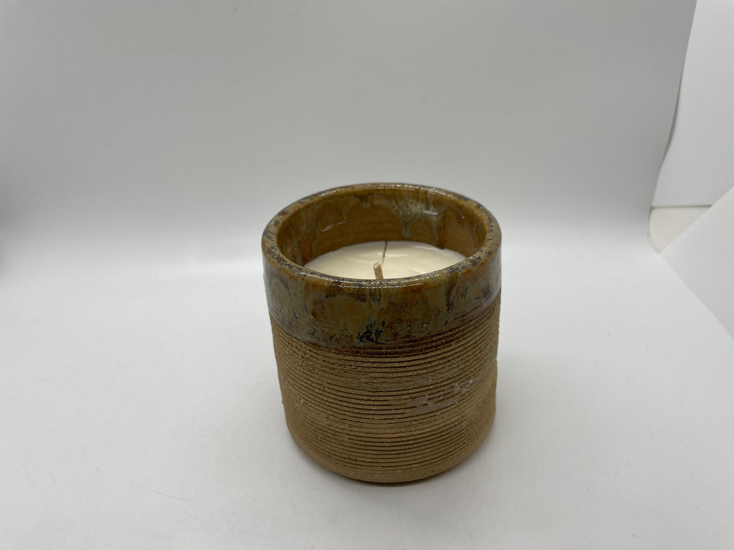unscented candle in pottery